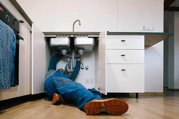 Professional Plumbing technician working in Dubuque, IA
